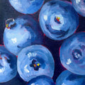 Blueberries on Blue Background